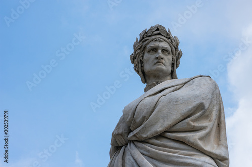 Dante Alighieri statue in florence, italy, close up. Italian writter