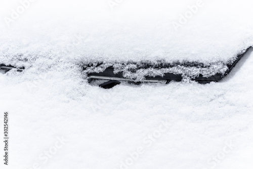 Snow covered car. Snowdrift of snow by car. Car standing in snow. Winter, snow, car in snowdrift. © Андрей Прилуцкий