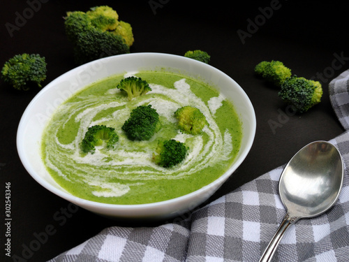 Bowl of broccoli soup with coconut cream