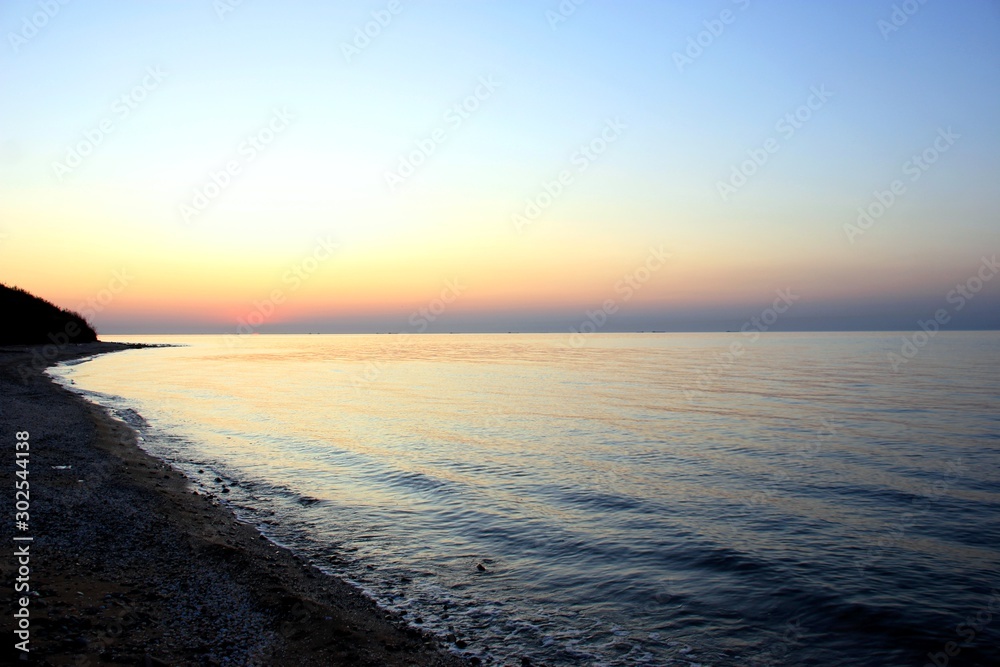 boat at sunset / sea / Crimean bridge / Black Sea? sunset
