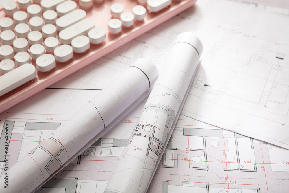 Construction concept. Residential building blueprint drawings and a ...