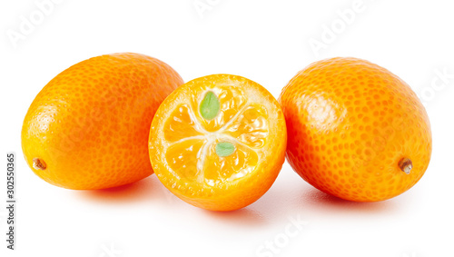Kumquat isolated on white background. Whole fruit with half