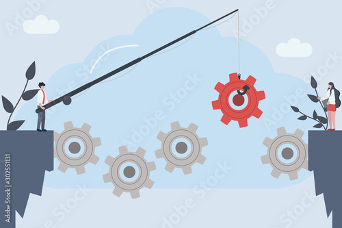 People team with gears - business management and working process. Man is installing the gear into mechanism.