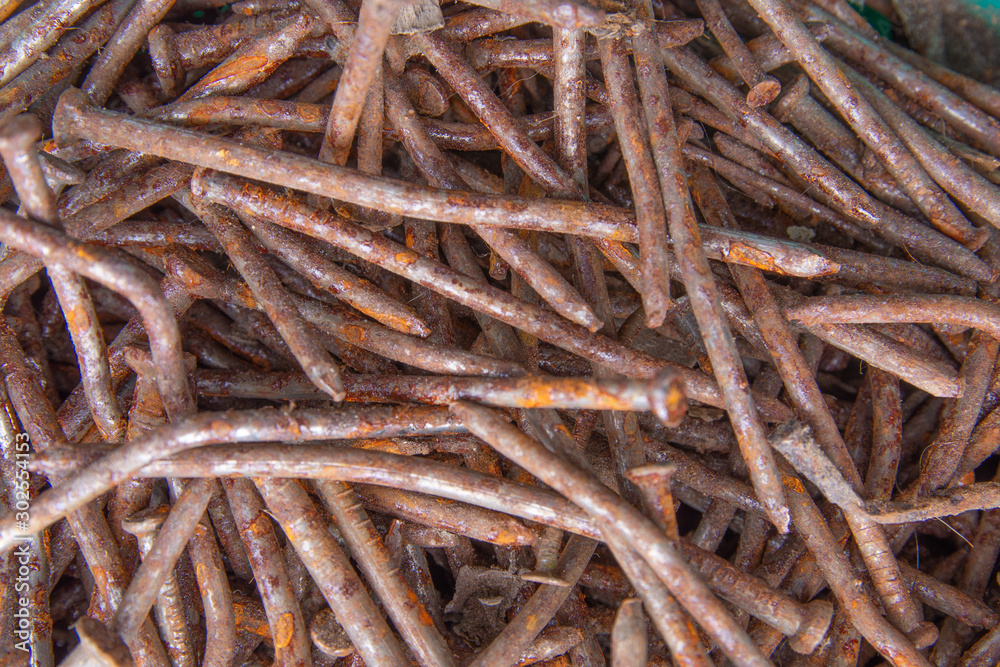 Many rusted nail,Group of Iron rust,Metal surface becomes brown from deterioration. From above Many rusted nail,Group of Iron rust,Metal surface becomes brown from deterioration. From above