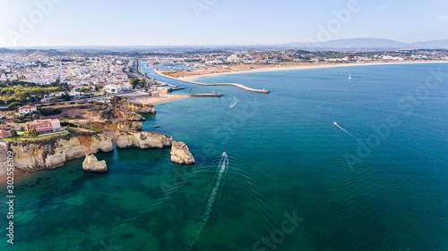 Fototapeta Naklejka Na Ścianę i Meble -  Aerial. Beautiful views of beaches of Lagos Town, from the sky. Portugal