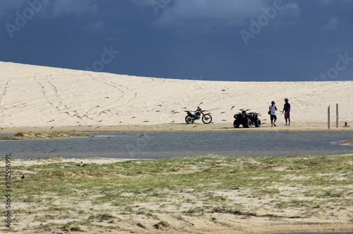 motorcycle and quad bike in the sand dunes