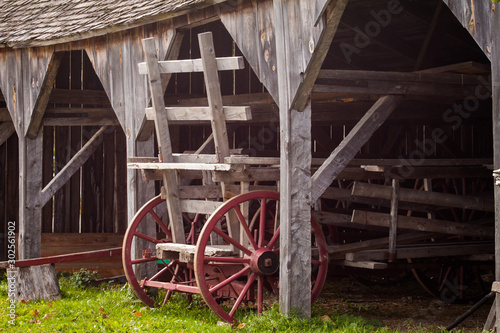 old wagon wheel of barn