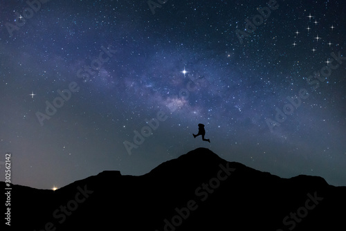 Panorama blue night sky milky way and star on dark background.Universe filled with stars, nebula and galaxy with noise and grain.Photo by long exposure and select white balance.Dark night sky.