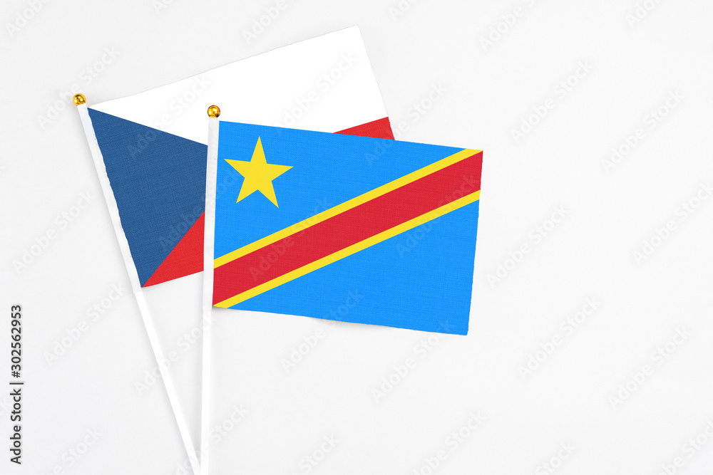 Congo and Cyprus stick flags on white background. High quality fabric, miniature national flag. Peaceful global concept.White floor for copy space. Congo and Cyprus stick flags on white background. High quality fabric, miniature national flag. Peaceful global concept.White floor for copy space.