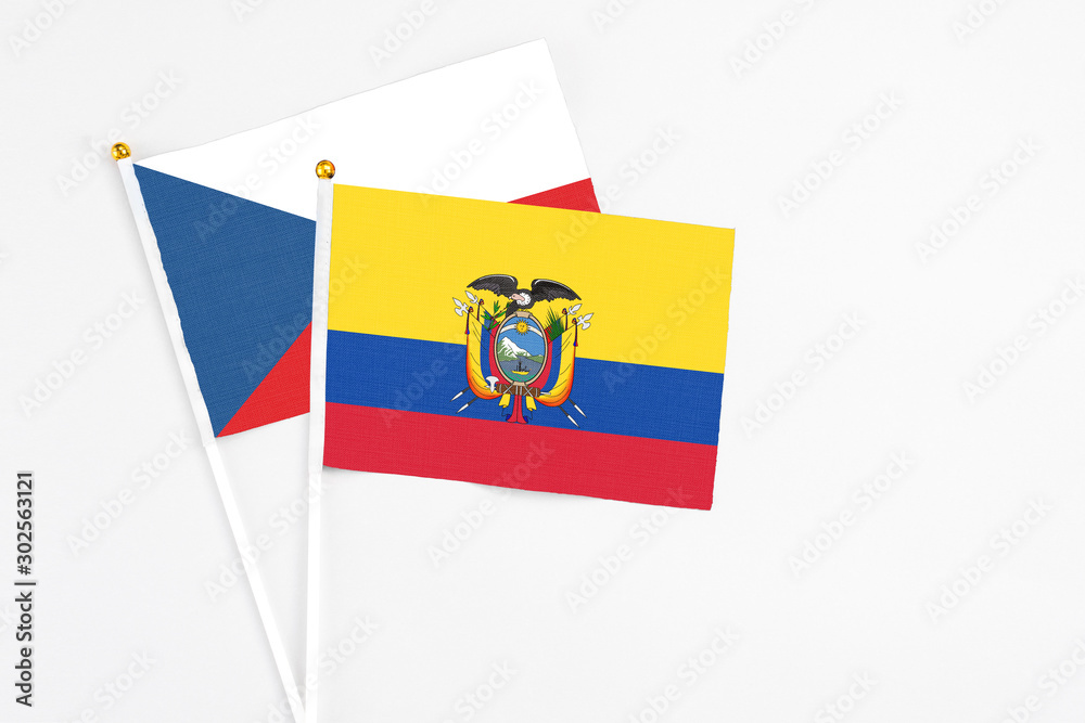Ecuador and Cyprus stick flags on white background. High quality fabric, miniature national flag. Peaceful global concept.White floor for copy space. Ecuador and Cyprus stick flags on white background. High quality fabric, miniature national flag. Peaceful global concept.White floor for copy space.