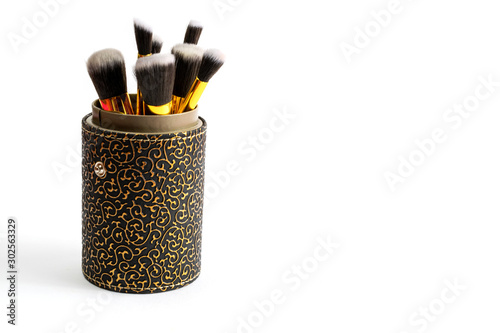 Makeup products. Cosmetic drawing brushes for powder with copy s