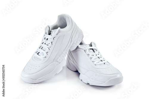 White sneakers isolated on a white background.