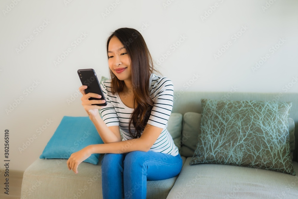 Portrait beautiful young asian woman using or talking mobile phone Portrait beautiful young asian woman using or talking mobile phone