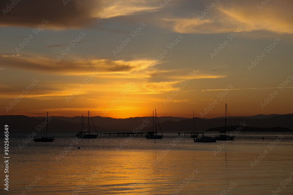Naklejka premium beach with golden sunset