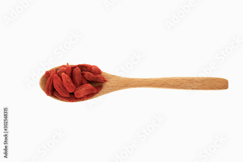 wolfberry in spoon with white background photo