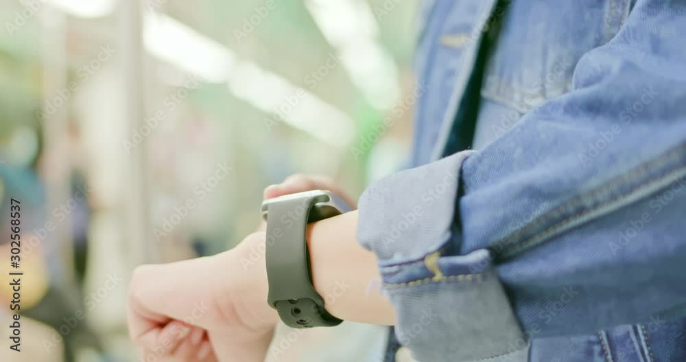 woman look wearable smart watch
