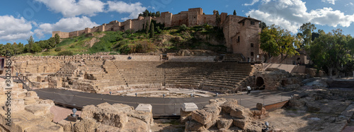 The 2,000 year old Roman Theater of Malaga with the Alcazaba in the background photo