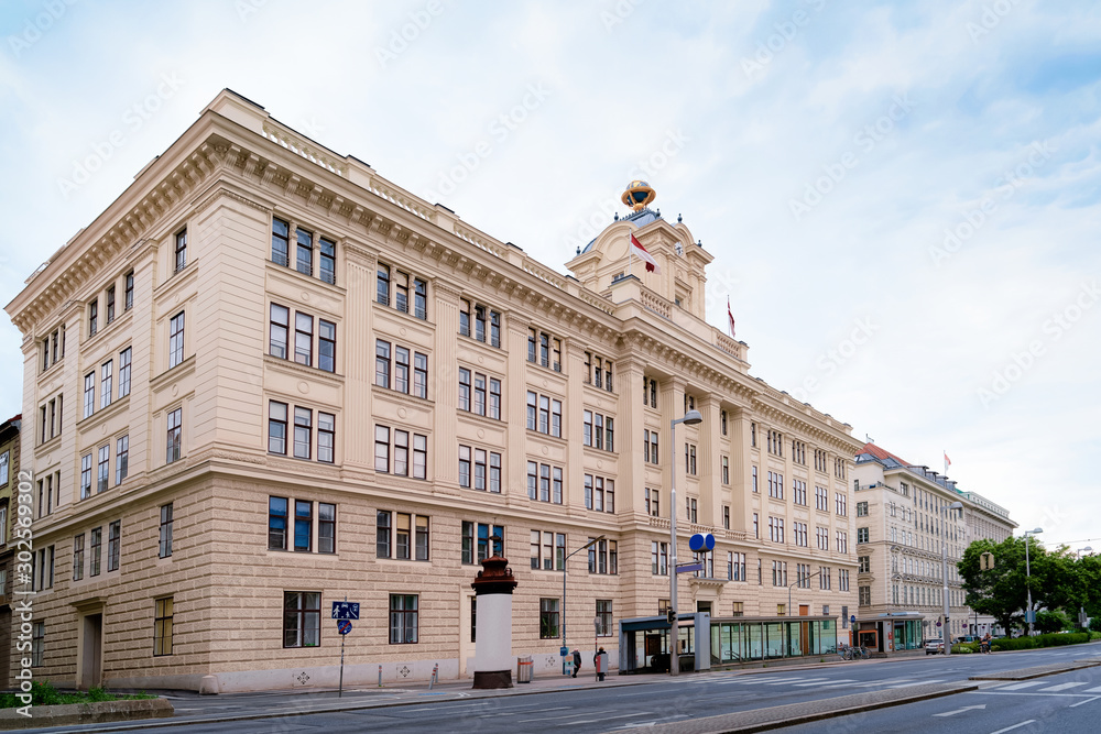 View on Vienna City Council. Former Military Geography Institute on Friedrich-Schmidt-Platz and Landesgerichtsstrasse in Innere Stadt of Vienna of Austria. Cityscape with street and Building