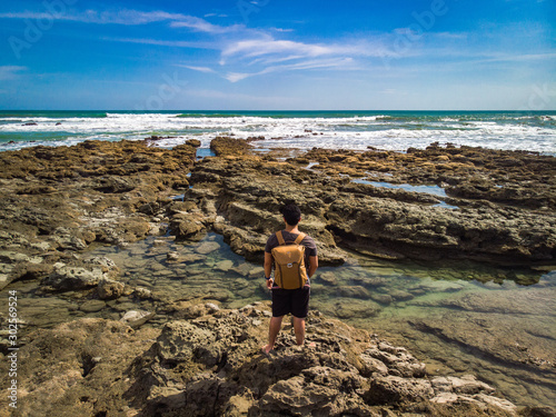 Man staring at the sea in Santa Teresa, Costa Rica