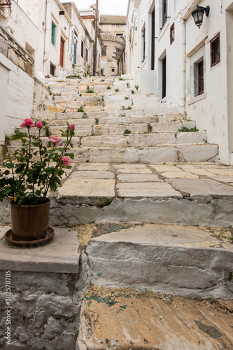 Fototapeta Naklejka Na Ścianę i Meble -  Stone steps, Church, Filoti Village, Naxos, Greece