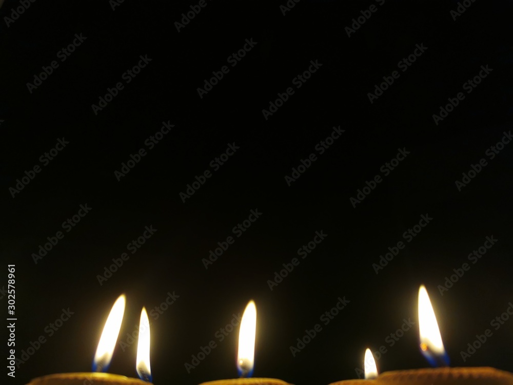 A Candle light during the festivities of Diwali. Flame of light during Diwali festival