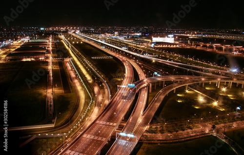 Tollway at Suvarnabhumi Airport at night with low speed light. 