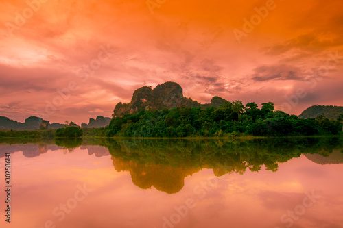Natural background of a large reservoir in Krabi Thailand Nong Thale atmosphere surrounded by mountains trees of various sizes  blown through the wind blurred cool during the day a viewpoint of travel