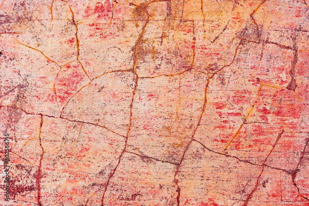 Obraz premium Texture of a concrete wall with cracks and scratches which can be used as a background