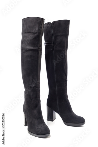 women's black leather high heeled boots isolated on white background