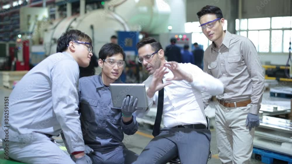 Confident Chinese manager and engineers talking in factory,HD Confident Chinese manager and engineers talking in factory,HD