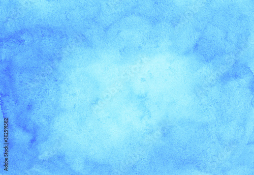 Watercolor light blue background texture hand painted. Watercolour sky blue stains on paper. 