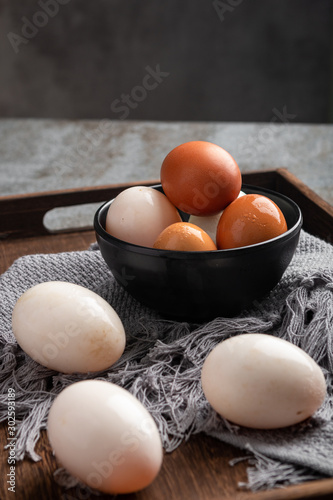 Chicken egg and duck egg in dark mood background