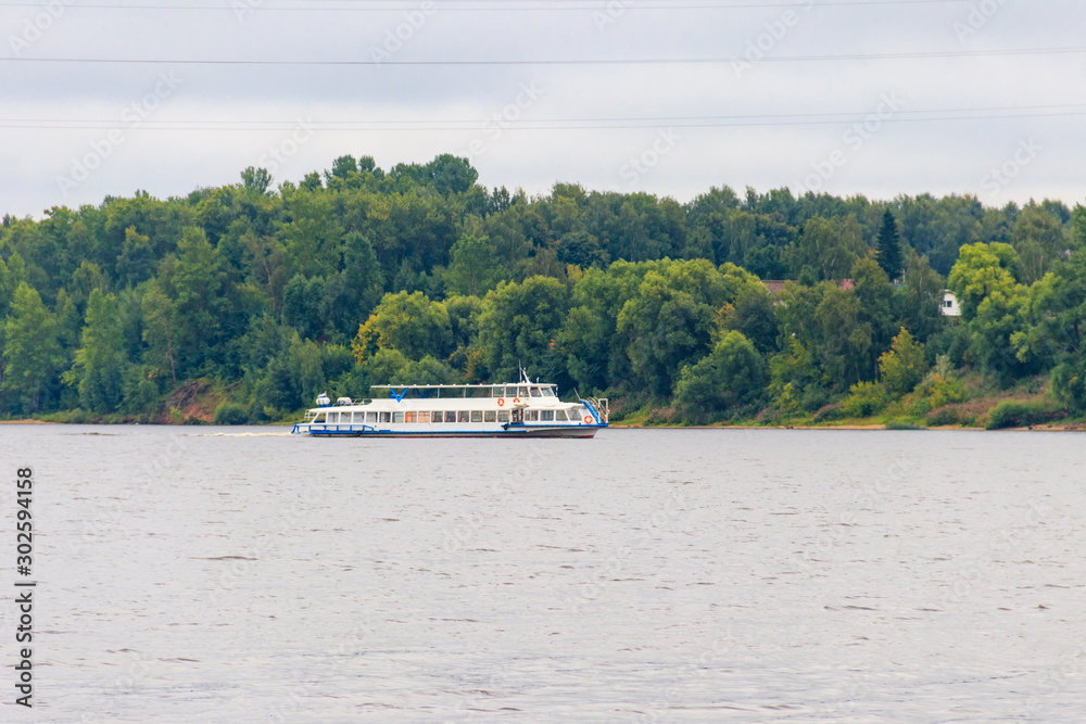 Passenger ship sailing on the Volga river in Yaroslavl, Russia Passenger ship sailing on the Volga river in Yaroslavl, Russia