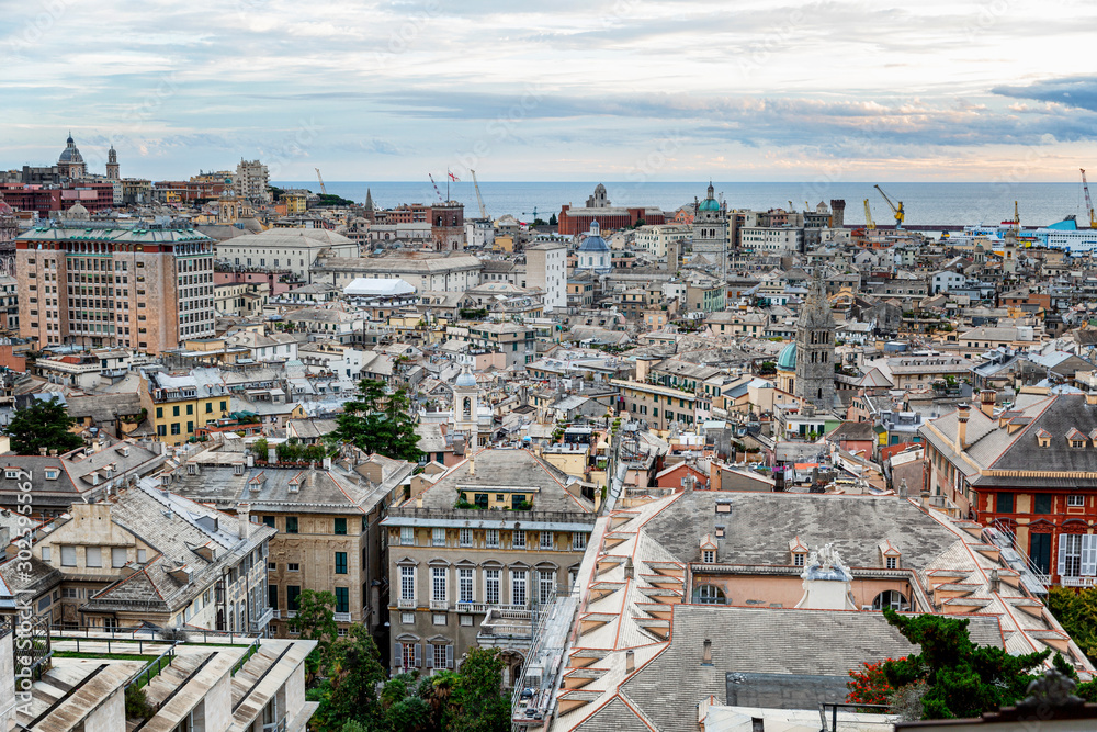Beautiful top view of the historic center of the sea in Genoa. Colorful old houses.