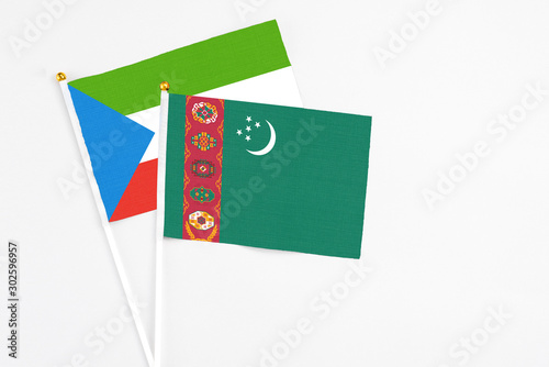 Free Download Turkmenistan and Equatorial Guinea stick flags on white background. High quality fabric, miniature national flag. Peaceful global concept.White floor for copy space. - GFXLoad