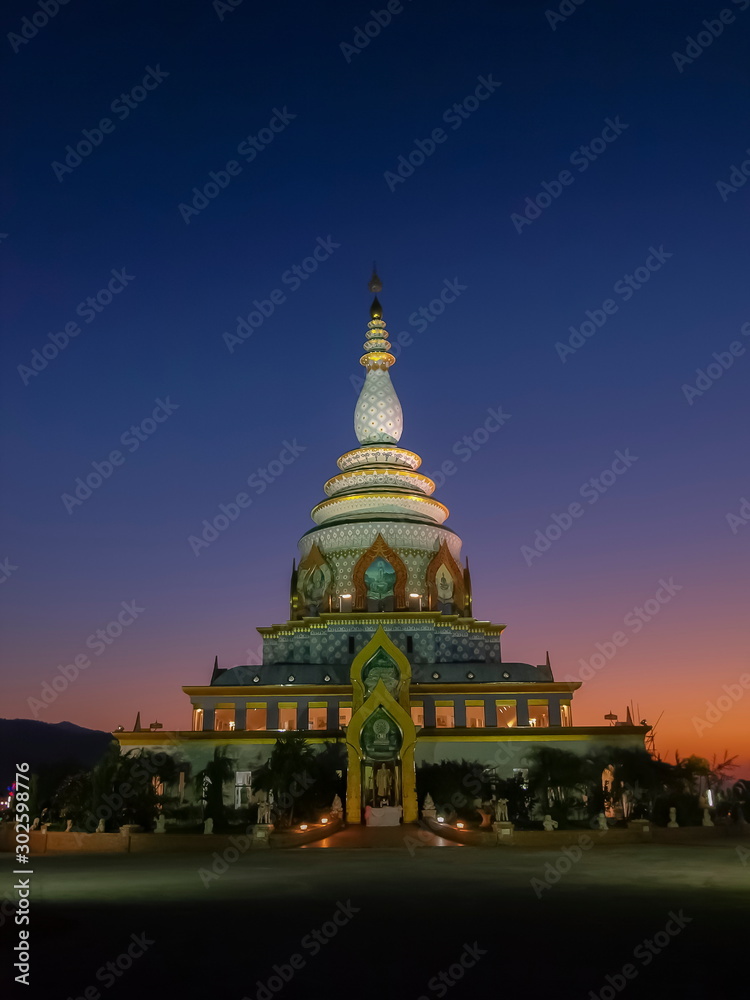 Fototapeta premium view morning of Crystal Pagoda or Chedi Kaew with blue sky background, Wat Tha Ton, Tha Ton, Fang, Chiang Mai, northern of Thailand.