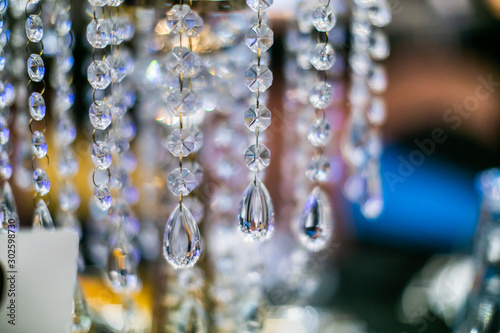Beautiful glass table decorations close up restaurant evening event © Stella Kou