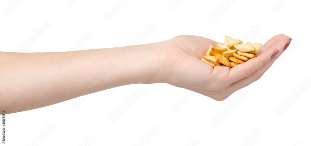 Square mini salted crackers, snack food. Isolated on white. Square mini salted crackers, snack food. Isolated on white.