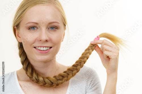 Blonde girl with long braid hair