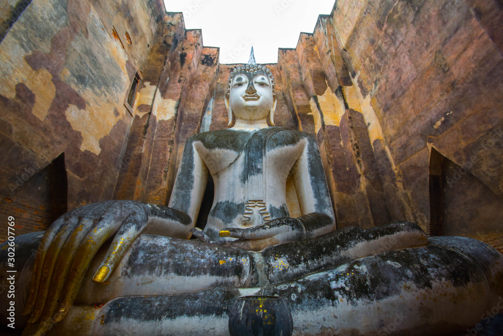 The Ancient Buddha Statue in The Ancient Temple in Sukhothai Thailand