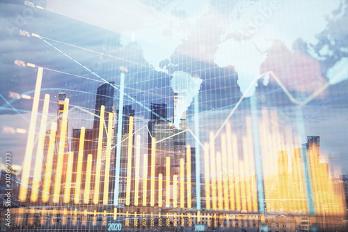 Double exposure of financial graph and world map on city veiw background. Concept of financial market research and analysis