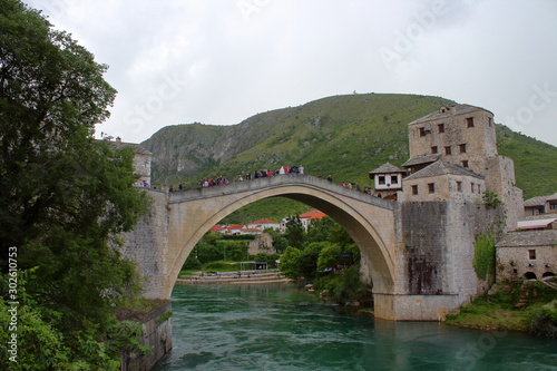old stone bridge over the river in mostar © Mariangela