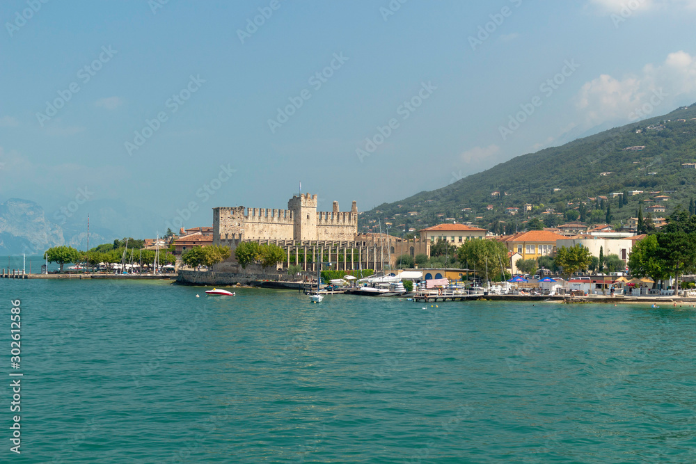 View from the lake Garda of the castle Scaliger de Torri del Benaco, Italy