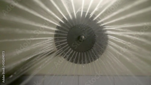 Psycho shower scene - water falling from shower head, water turns off, low-angle shot
