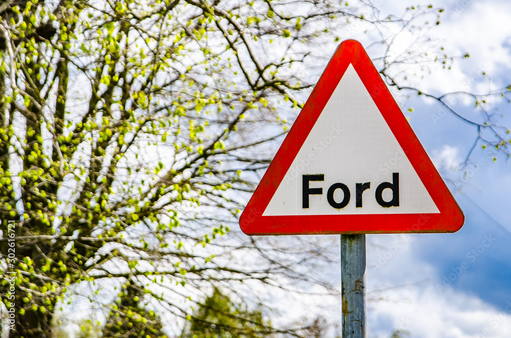British street sign showing the word Ford against spring background.