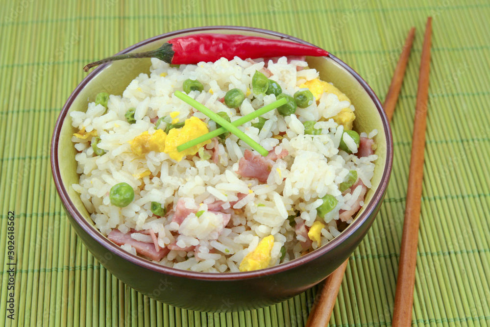 bowl of Cantonese rice on a table bowl of Cantonese rice on a table