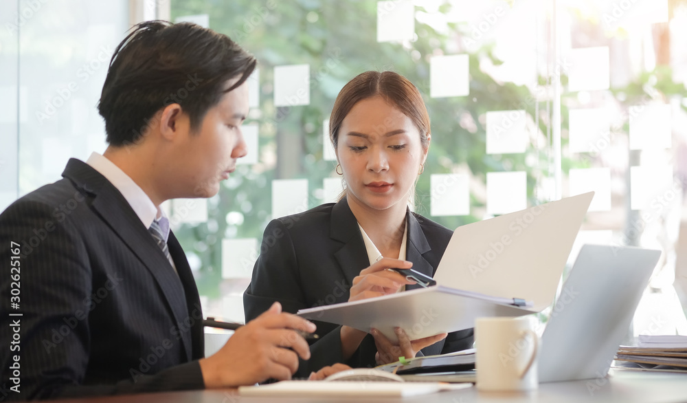 Business working in office with documents and laptop people Consulting and business planning. Business working in office with documents and laptop people Consulting and business planning.