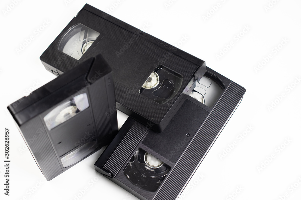 Old videotapes on a white background.