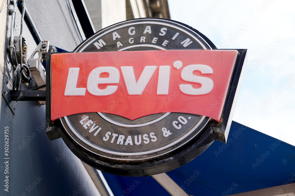 Levi's Jeans Sign and Logo levis store levi strauss french shop Stock Photo  | Adobe Stock