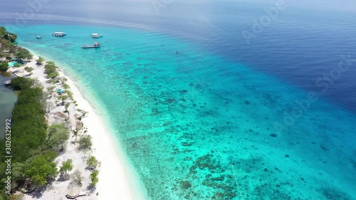 Top view of sandy beach and  the Sumilon island beach landing near Oslob, Cebu, Philippines.
